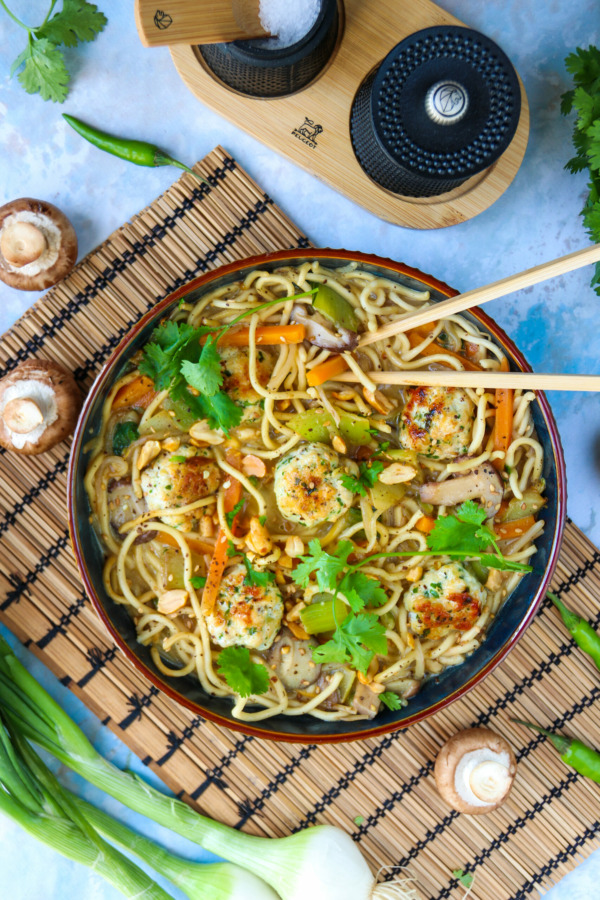 Thai-style chicken balls with noodles and vegetables